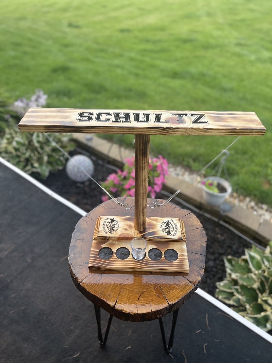 Personalized wooden ring toss game set up outdoors