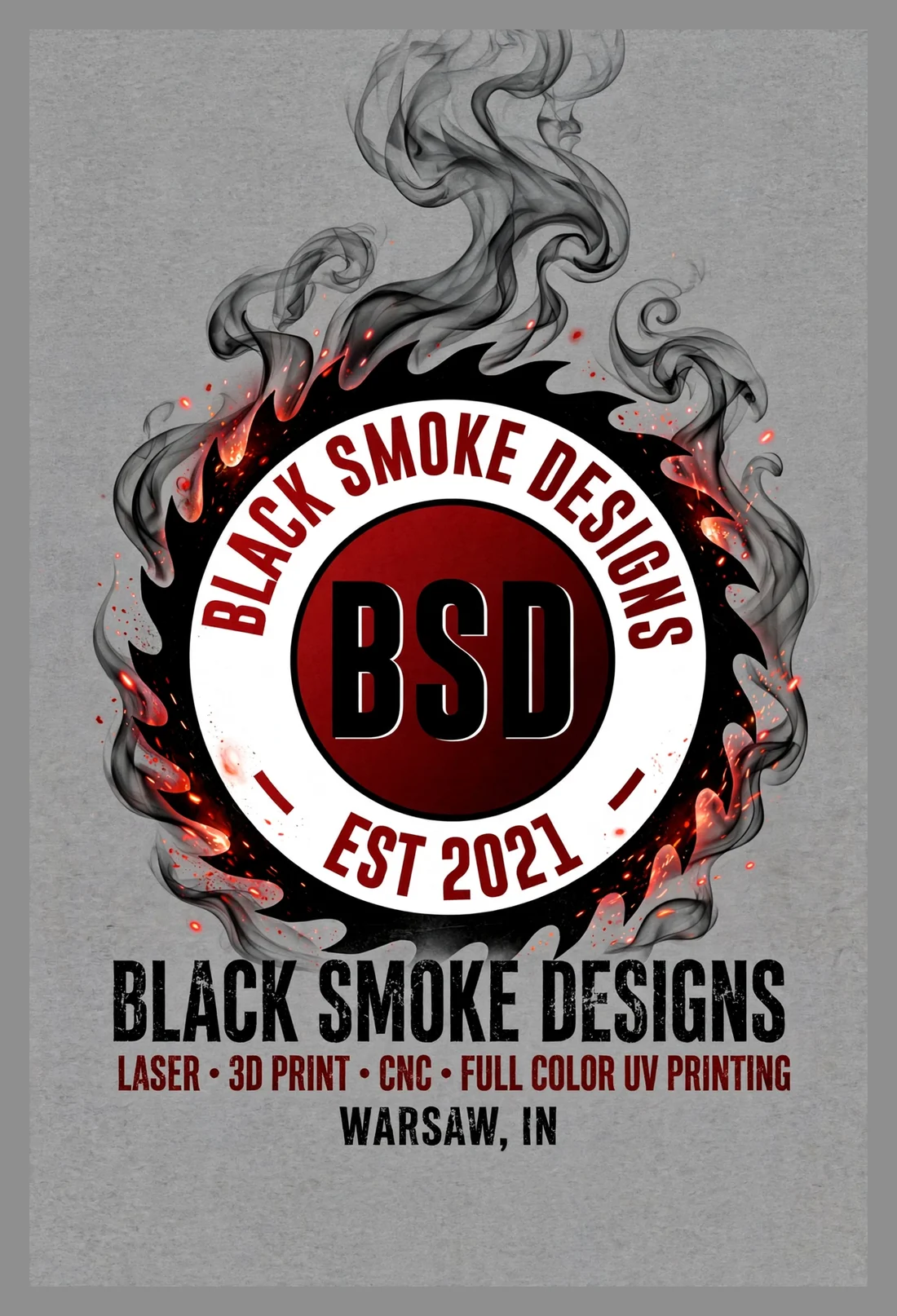 Black Smoke Designs T-shirt back artwork on heather grey — saw-blade logo with smoke and embers